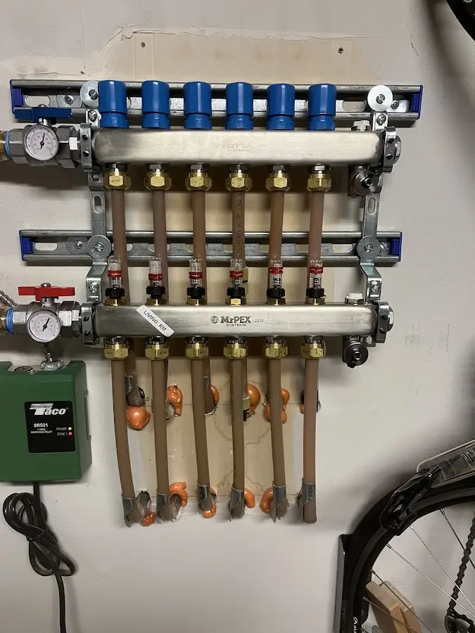 Plumber performing Water Heater Repair at a residential property in Longmont